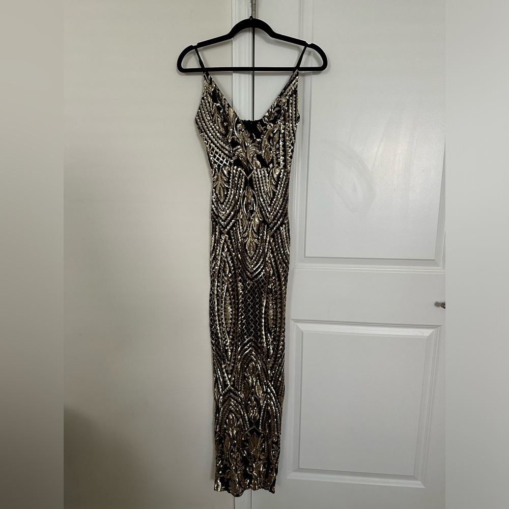 Black & gold sequin dress.